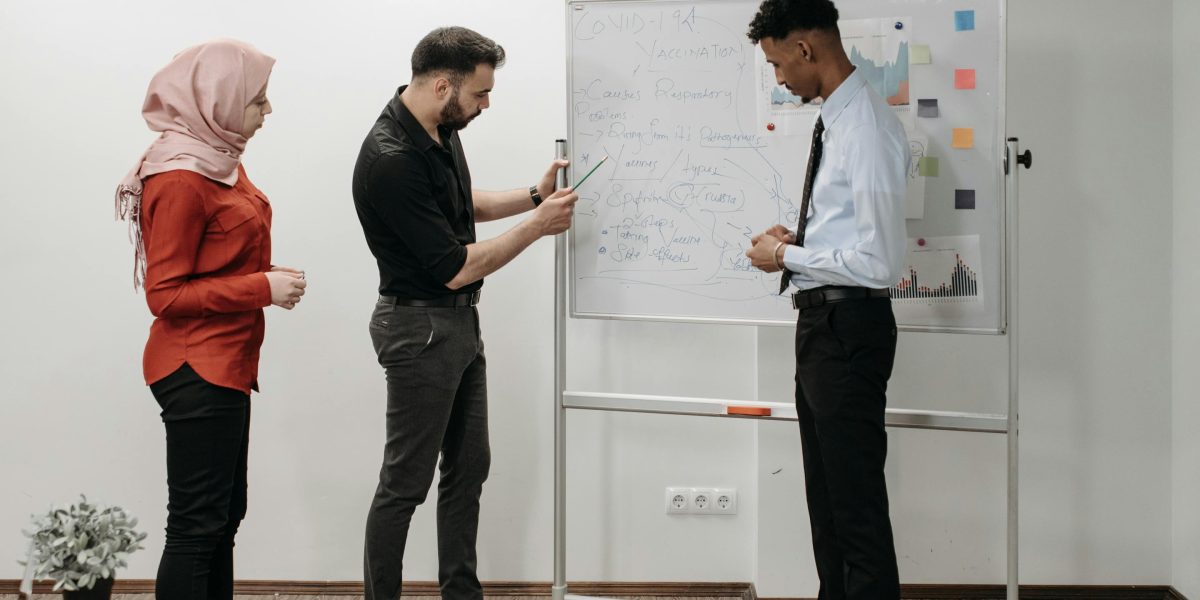 A team collaborating on a machine learning project, leveraging integrated development environments.