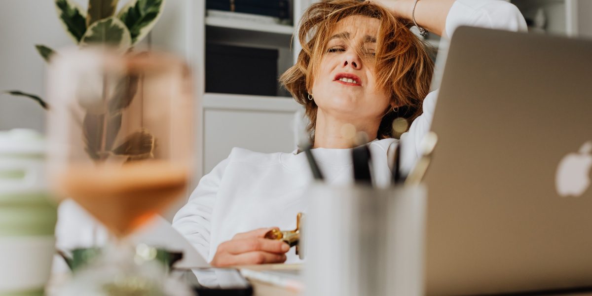 A professional experiencing burnout or fatigue from constant tool changes and complexity.