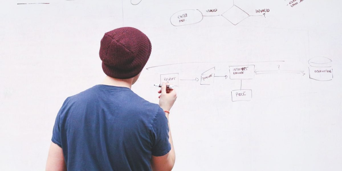 A developer deeply engaged in solving a complex problem, symbolizing innovation.
