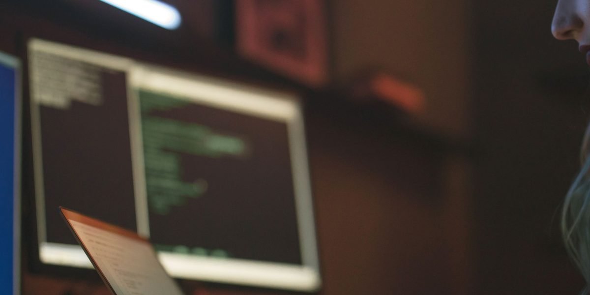 A professional focused on reviewing security configurations, representing the critical task of maintaining robust cloud security and compliance.