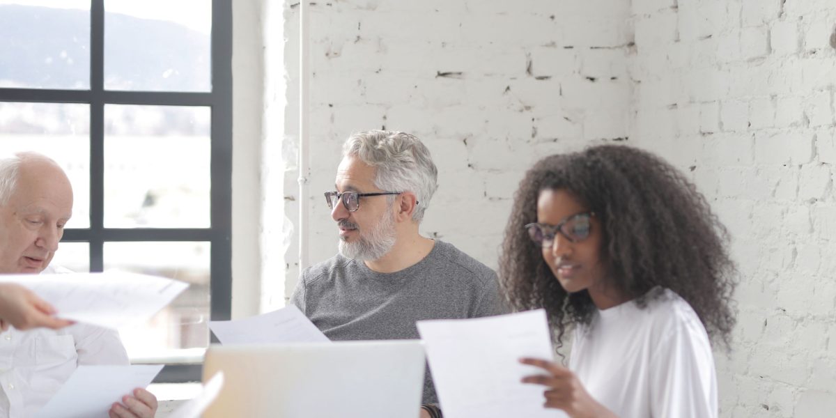 A product team brainstorming and collaborating on new ideas, facilitated by rapid prototyping with no-code tools.