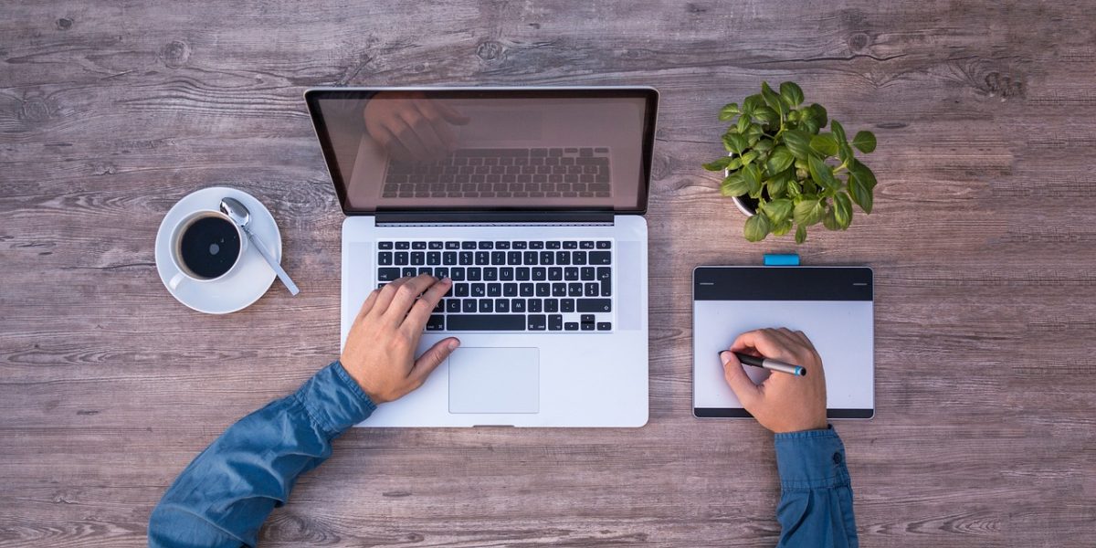 A person enjoying the freedom of remote work, balancing professional tasks with personal well-being.