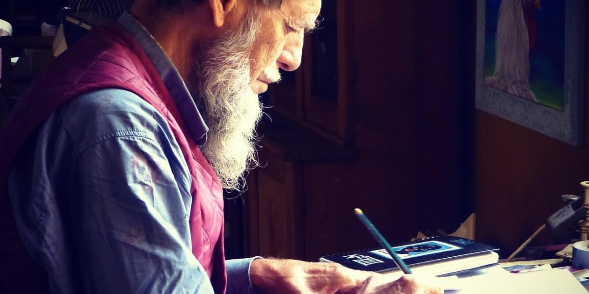 A person intently focused on preparing job applications, emphasizing strategic effort for remote roles.