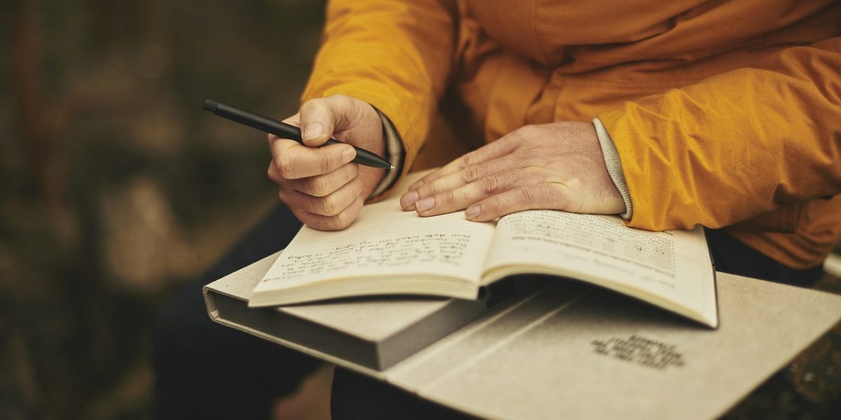 A person carefully assessing financial documents and educational expenses to make an informed decision.