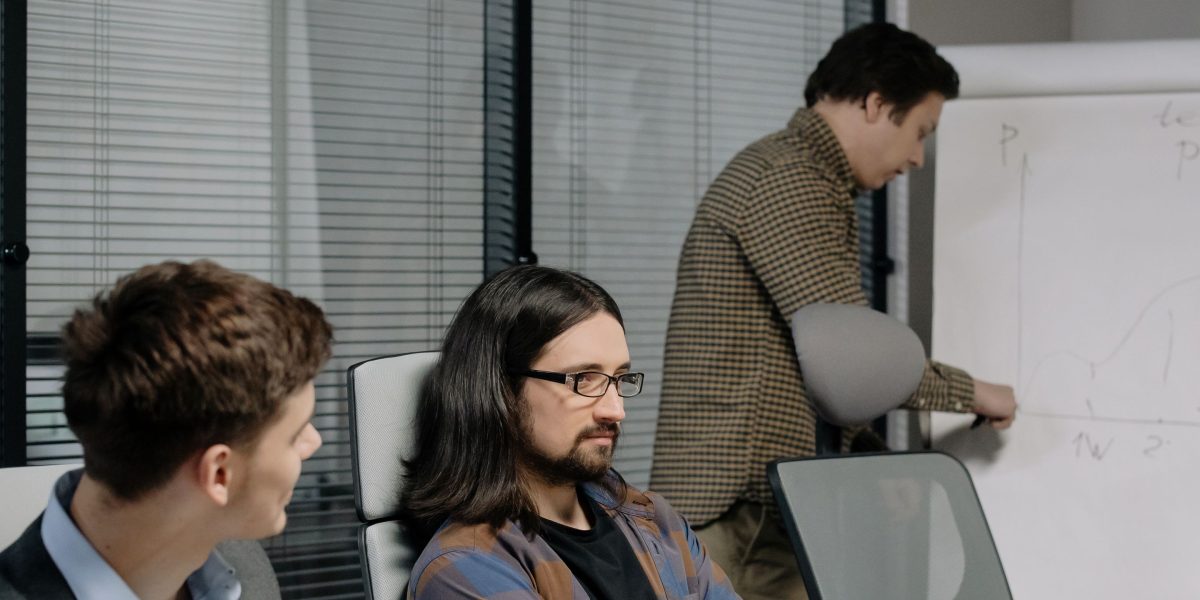 Professionals engaged in a discussion to select the best AI-powered study tools for their team's needs.